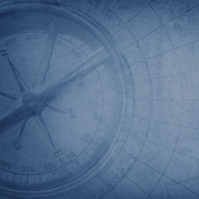 Blue textured background featuring a detailed compass design with directional markings